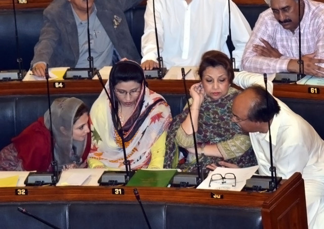 sindh education minister nisar khuhro discusses a matter with a fellow mpa during friday 039 s session photo rashid ajmeri sindh education minister nisar khuhro discusses a matter with a fellow mpa during friday 039 s session photo rashid ajmeri