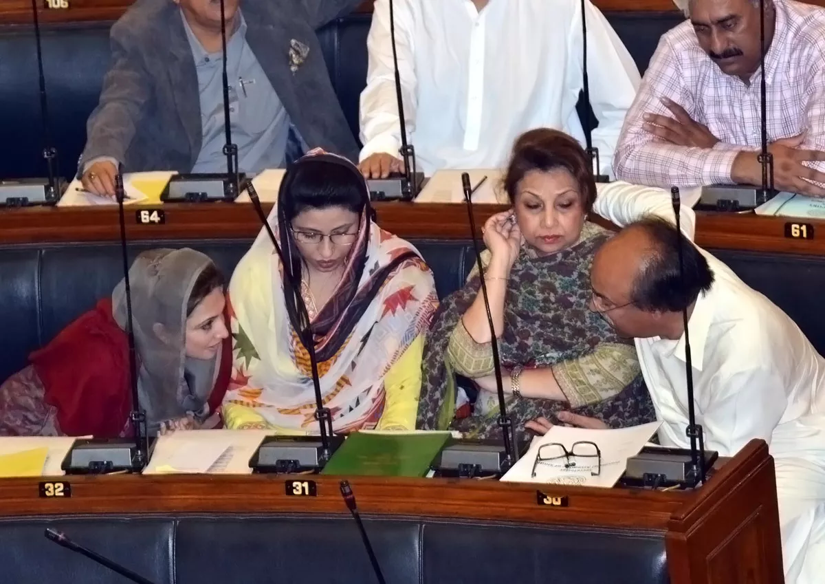 sindh education minister nisar khuhro discusses a matter with a fellow mpa during friday 039 s session photo rashid ajmeri sindh education minister nisar khuhro discusses a matter with a fellow mpa during friday 039 s session photo rashid ajmeri