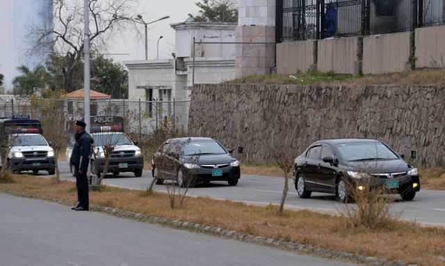 police escort cars carrying judges as they arrive a special court set up to try former pakistani military ruler pervez musharraf in islamabad on february 21 2014 photo afp police escort cars carrying judges as they arrive a special court set up to try former pakistani military ruler pervez musharraf in islamabad on february 21 2014 photo afp