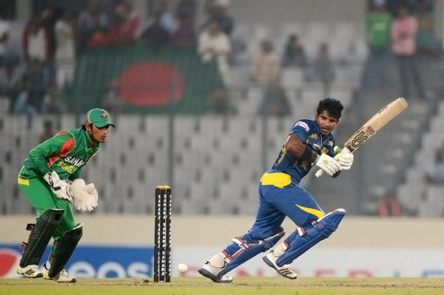 sri lankan batsman kusal perera r plays a shot as bangladesh wicketkeeper anamul haque looks on during the third one day international odi cricket match between bangladesh and sri lanka photo afp sri lankan batsman kusal perera r plays a shot as bangladesh wicketkeeper anamul haque looks on during the third one day international odi cricket match between bangladesh and sri lanka photo afp