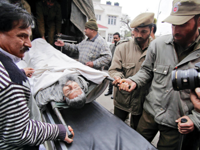 the body of shaukat ali is brought to the government medical hospital for a post mortem in jammu on saturday photo afp the body of shaukat ali is brought to the government medical hospital for a post mortem in jammu on saturday photo afp