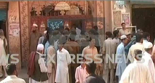 a crowd had gathered outside the police station demanding the attackers be handed over to them photo express news a crowd had gathered outside the police station demanding the attackers be handed over to them photo express news
