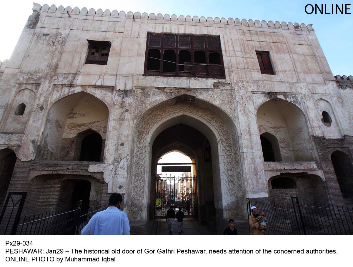 the historical old door of gor gathri peshawar photo online