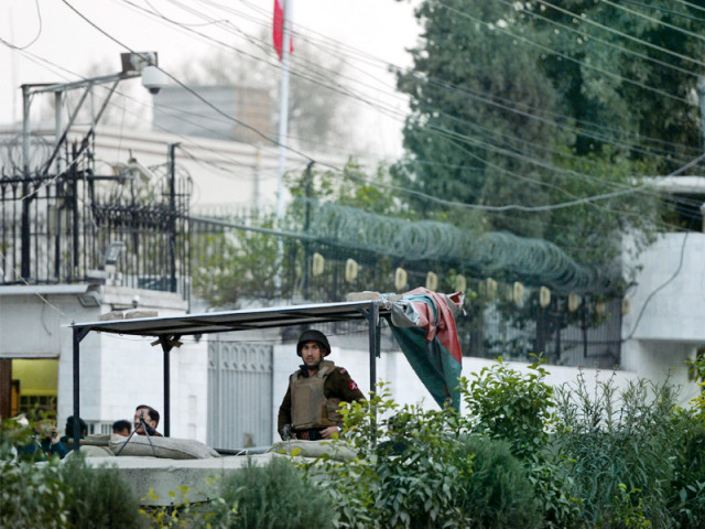 security personnel stand guard at the iranian consulate following the attack photo afp security personnel stand guard at the iranian consulate following the attack photo afp