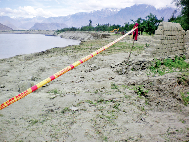 hoto is 20 metres above the indus river alongside the main road connecting gilgit with skardu flooding in last summer season swept away many dwellings built on the eroding land of the village photo express