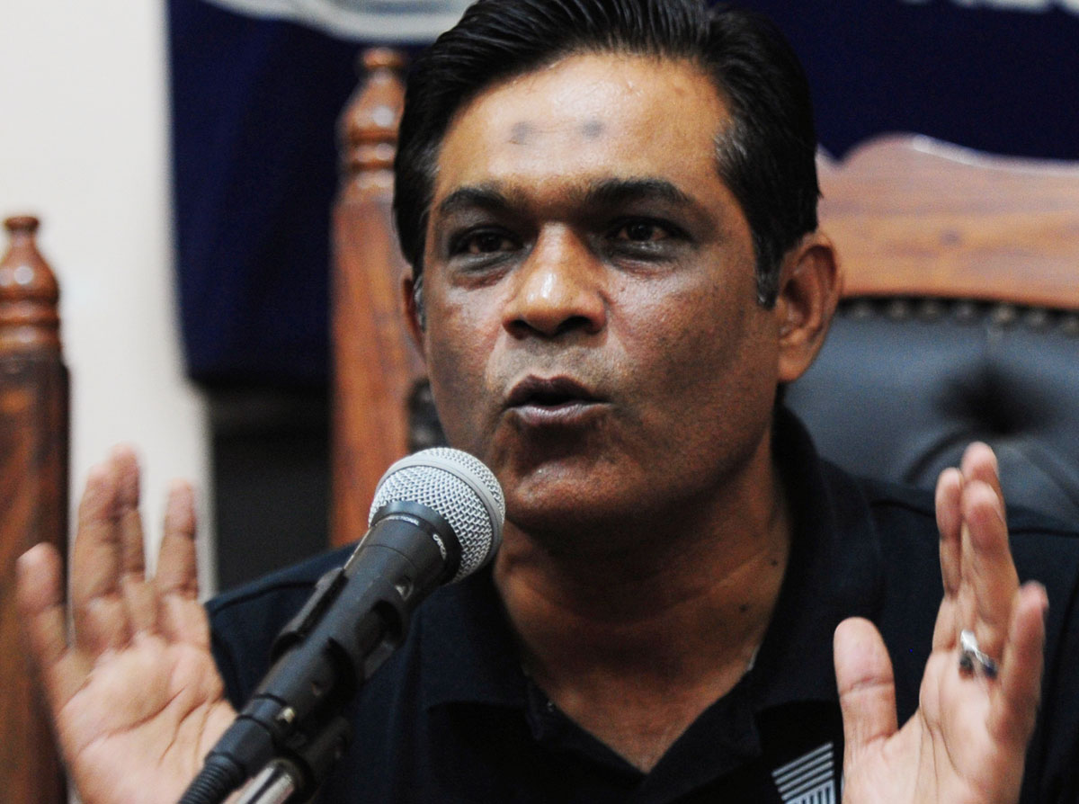 former cricket captain rashid latif gestures during a press conference in karachi photo afp