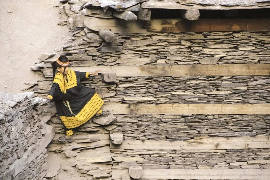 a girl precariously perched on stone ledges some houses here can be easily accessed via stairs while others can be reached only by scaling stone walls photos danial shah a girl precariously perched on stone ledges some houses here can be easily accessed via stairs while others can be reached only by scaling stone walls photos danial shah