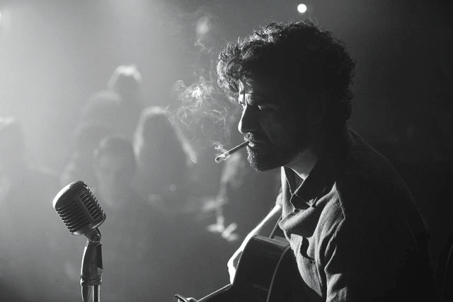 the coen brothers take you on a melancholic trip where folk music harsh winter and a careless yet appealing songwriter pull you in the coen brothers take you on a melancholic trip where folk music harsh winter and a careless yet appealing songwriter pull you in