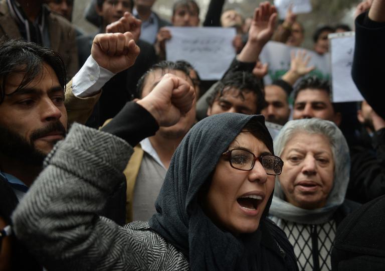 afghan activists chant slogans condemning the killing of 21 soldiers during a demonstration in kabul on february 26 2014 photo afp