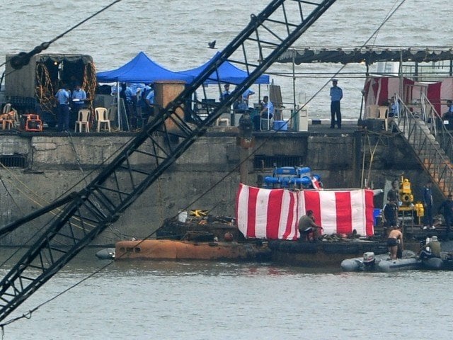 18 naval crew were killed in august last year when the fully armed russian built ins sindhurakshak exploded in flames and sank in a military shipyard in mumbai photo afp file