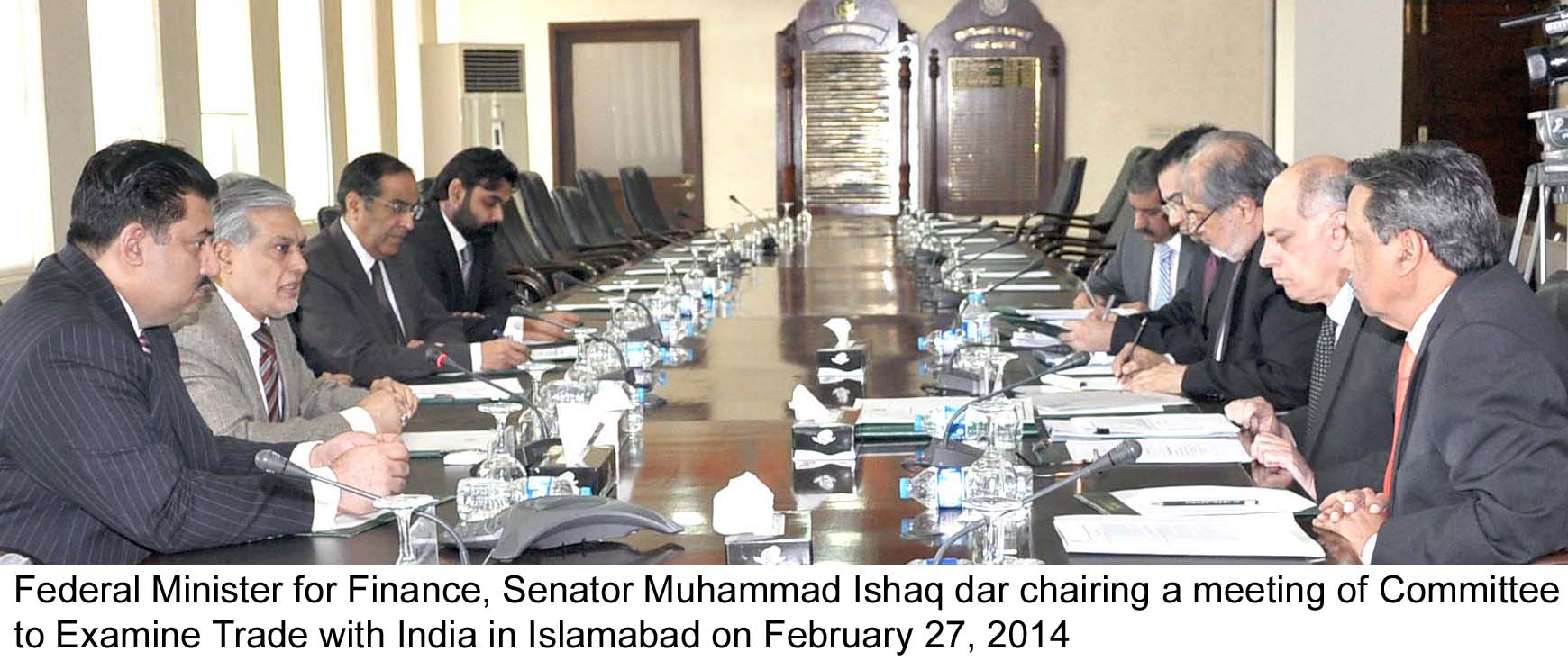 federal finance minister ishaq dar 2nd l and federal minister for commerce and textile khurram dastagir khan l in a meeting on trade with india photo pid