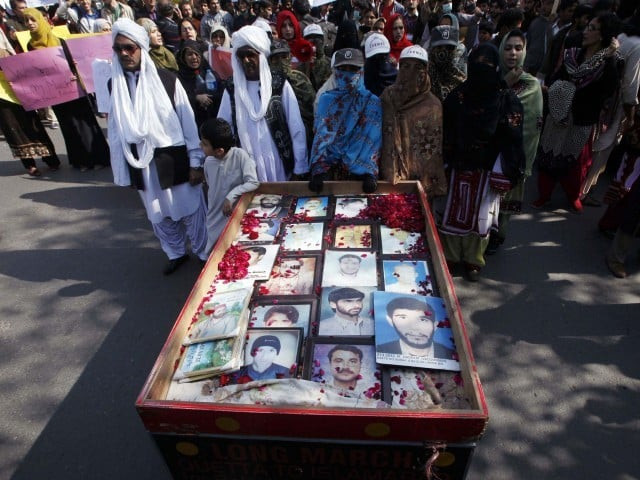 long march participants place portraits of their missing relatives on a push cart photo reuters long march participants place portraits of their missing relatives on a push cart photo reuters