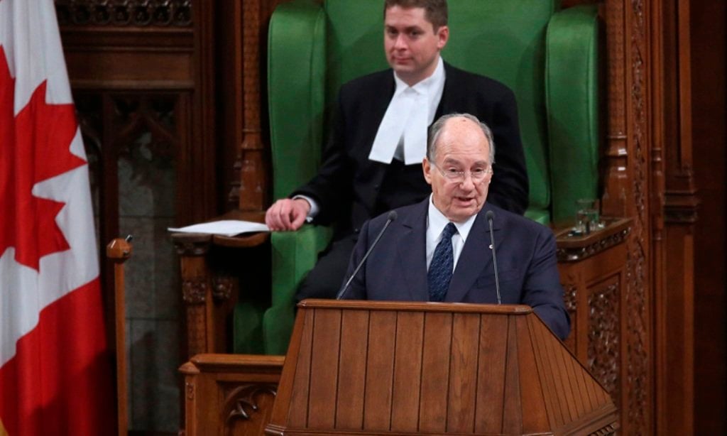 the aga khan spiritual leader of ismaili muslims addresses a joint session of parliament as house of commons speaker andrew scheer listens in ottawa february 27 2014 photo reuters