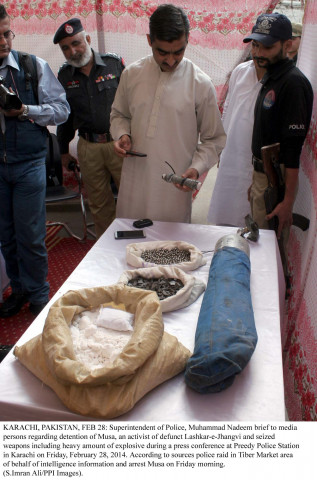officials display the material that is used in making bombs recovered during raids on friday photo ppi officials display the material that is used in making bombs recovered during raids on friday photo ppi