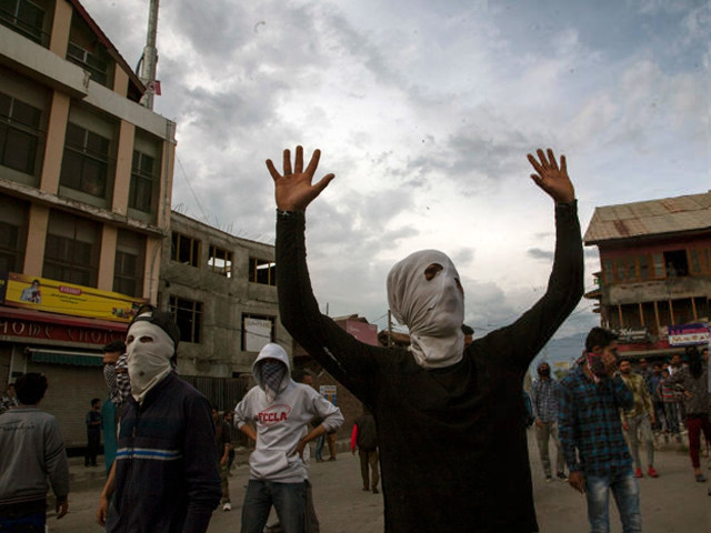 masked kashmiri muslims shout anti indian slogans as they attend the funeral of adil ahmed yadoo a civilian mowed down by an indian police armored vehicle during his funeral procession on may 5 2018 in srinagar photo getty masked kashmiri muslims shout anti indian slogans as they attend the funeral of adil ahmed yadoo a civilian mowed down by an indian police armored vehicle during his funeral procession on may 5 2018 in srinagar photo getty