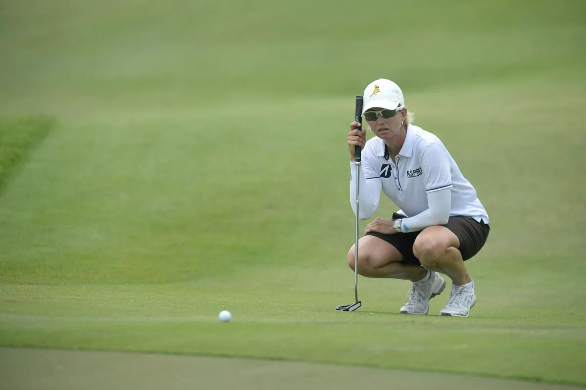 karrie webb of australia lines up a putt during the third round of the 2014 hsbc women 039 s champions golf tournament in singapore on march 1 2014 photo afp karrie webb of australia lines up a putt during the third round of the 2014 hsbc women 039 s champions golf tournament in singapore on march 1 2014 photo afp