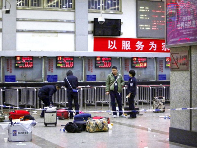 police stand near luggage left at the ticket office after the attack photo reuters