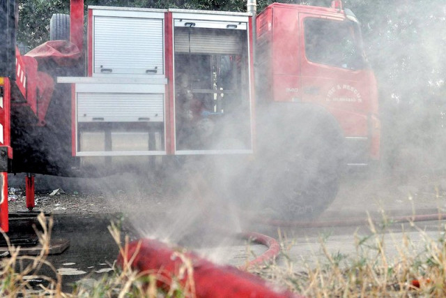 cda staffers dousing the fire left while the condition of the equipment they use is on display for all right photos zafar aslam express cda staffers dousing the fire left while the condition of the equipment they use is on display for all right photos zafar aslam express