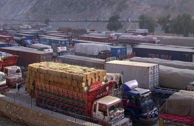 in this file photo cargo trucks including those carrying supplies to nato forces in afghanistan are seen halted along the pakistan torkham border photo reuters