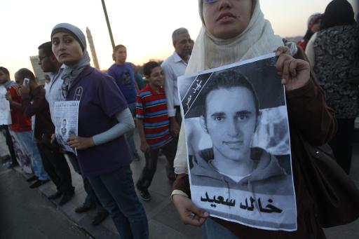 egyptian protesters gather on cairo 039 s landmark qasr al nil bridge to mark the first anniversary of the death of khaled said on june 6 2011 photo afp