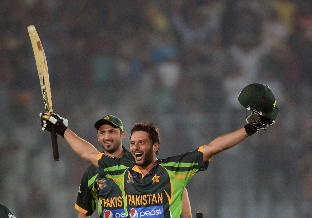 sahid afridi reacts r and junaid khan l looks on after winning the sixth match of the asia cup one day cricket tournament between india and pakistan at the sher e bangla national cricket stadium in dhaka on march 2 2014 photo afp