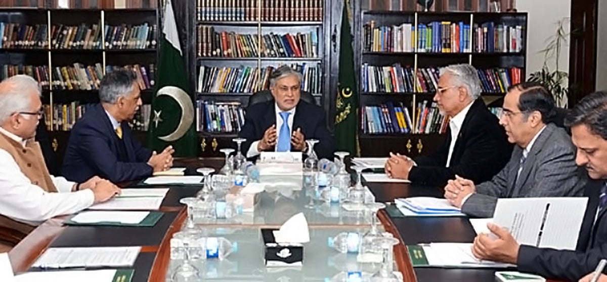 finance minister ishaq dar chairing a meeting with privatisation commission officials over property transfer for ptcl photo pid