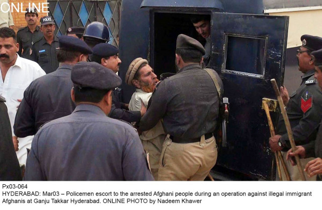 hyderabad policemen escort an illegal afghan refugee in ganju takkar on monday photo online