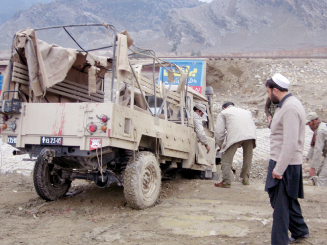 a view of the fc vehicle that was hit by a roadside bomb in landikotal photo inp a view of the fc vehicle that was hit by a roadside bomb in landikotal photo inp