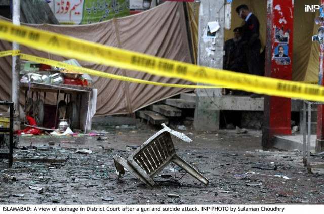 a view of damage in district court in islamabad after a gun and suicide attack photo inp a view of damage in district court in islamabad after a gun and suicide attack photo inp