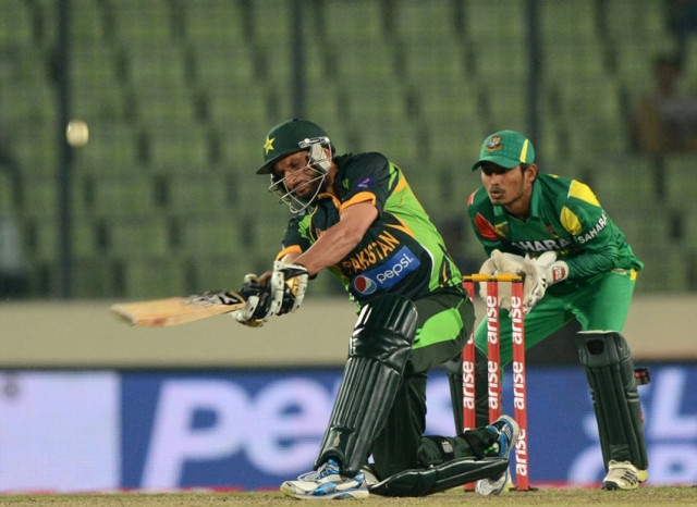 shahid afridi plays a shot as bangladesh wicketkeeper anamul haque looks on during the eighth match of the asia cup one day cricket tournament between bangladesh and pakistan at the in dhaka on march 4 2014 photo afp shahid afridi plays a shot as bangladesh wicketkeeper anamul haque looks on during the eighth match of the asia cup one day cricket tournament between bangladesh and pakistan at the in dhaka on march 4 2014 photo afp