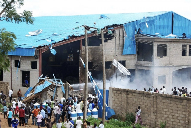 file photo of site hit by multiple bomb blasts in nigeria photo reuters file photo of site hit by multiple bomb blasts in nigeria photo reuters