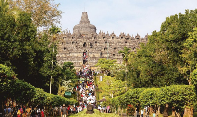 tourists and pilgrims are ascending to the top platform of borobudur temple by its main entrance which is on the eastern side photos fazal khaliq tourists and pilgrims are ascending to the top platform of borobudur temple by its main entrance which is on the eastern side photos fazal khaliq