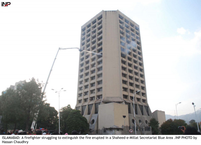 fire fighters try to extinguish the blaze on the ninth floor of the shaheed e millat secretariat building in blue area of islamabad photo inp fire fighters try to extinguish the blaze on the ninth floor of the shaheed e millat secretariat building in blue area of islamabad photo inp