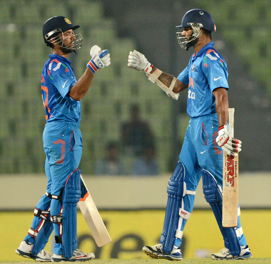 ajinkya rahane and shikhar dhawan put on a 121 run stand as india surpassed the modest target in the 33rd over of their innings photo afp