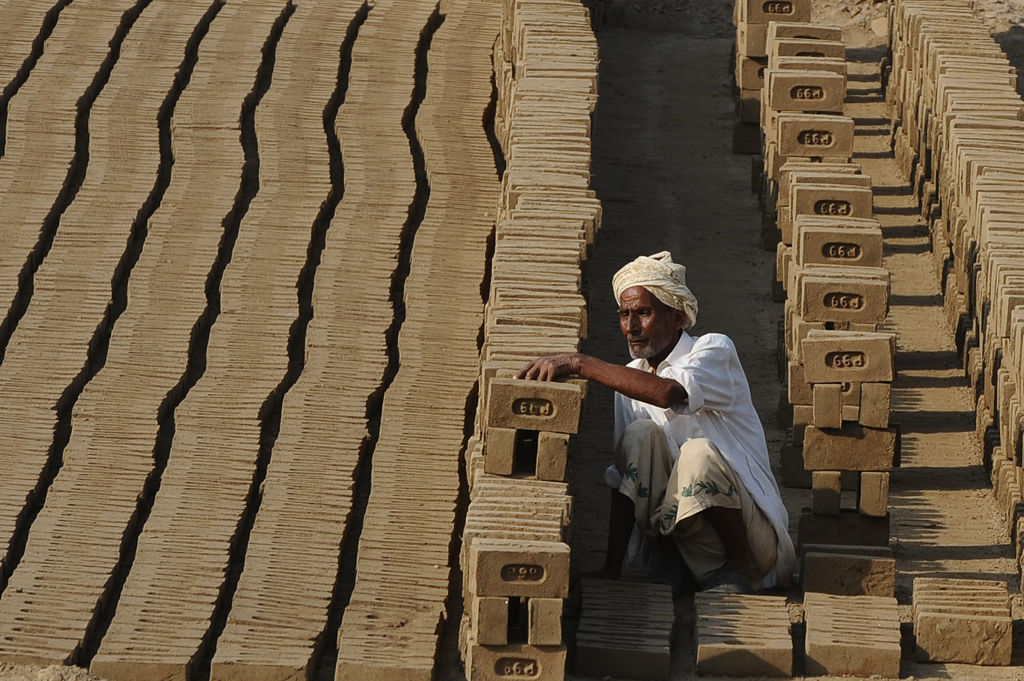 according to brick klin workers they were paid only rs450 500 for 1 000 bricks whereas under existing regulations a brick kiln worker should be paid at least rs740 for 1 000 bricks produced photo mehmood qureshi express