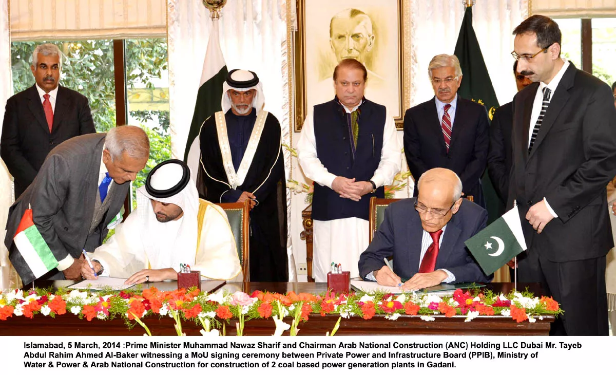 ppib md na zuberi signs the mou with vice chairman and ceo of anc faris tayeb abdul rahim al baker while the prime minister and minister for water and power watches photo pid ppib md na zuberi signs the mou with vice chairman and ceo of anc faris tayeb abdul rahim al baker while the prime minister and minister for water and power watches photo pid