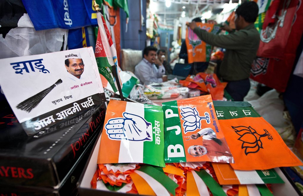 various indian national and regional political party flags and election campaign materials are seen for sale at a wholesale shop in new delhi on march 5 2014 photo afp