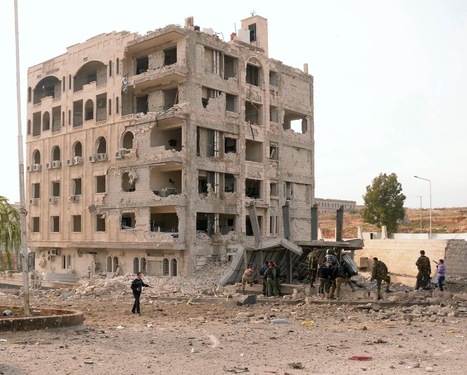 file photo of syrian security forces inspecting damages caused by a car bomb blast in the northern city of aleppo photo afp