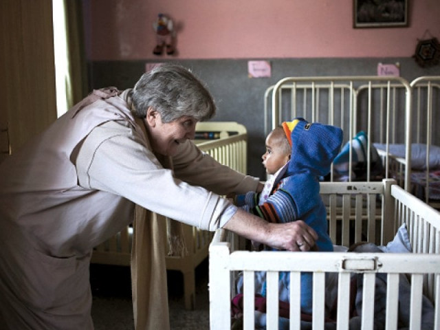 sister margaret walsh shares a moment with 11 month old honey who was left at the care of the hospice after his mother died and his father was unable to cope photo myra iqbal express sister margaret walsh shares a moment with 11 month old honey who was left at the care of the hospice after his mother died and his father was unable to cope photo myra iqbal express