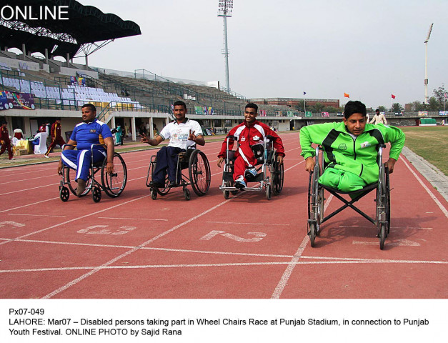 multan s ahmed yar wins the disabled persons wheelchair race photo online multan s ahmed yar wins the disabled persons wheelchair race photo online