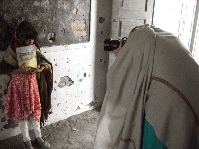 once gulmina graduated from university and moved back home she started using the camera again this time to photograph school going children photos gulmina mohmand once gulmina graduated from university and moved back home she started using the camera again this time to photograph school going children photos gulmina mohmand