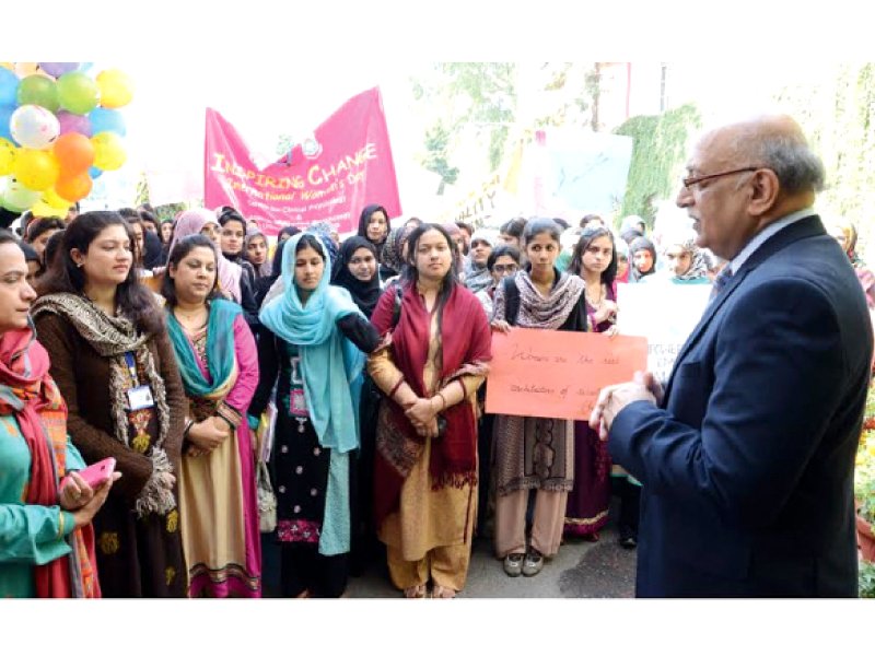 pu vc mujahid kamran addressing participants of a rally organised by the department of applied psychology photo abid nawaz express