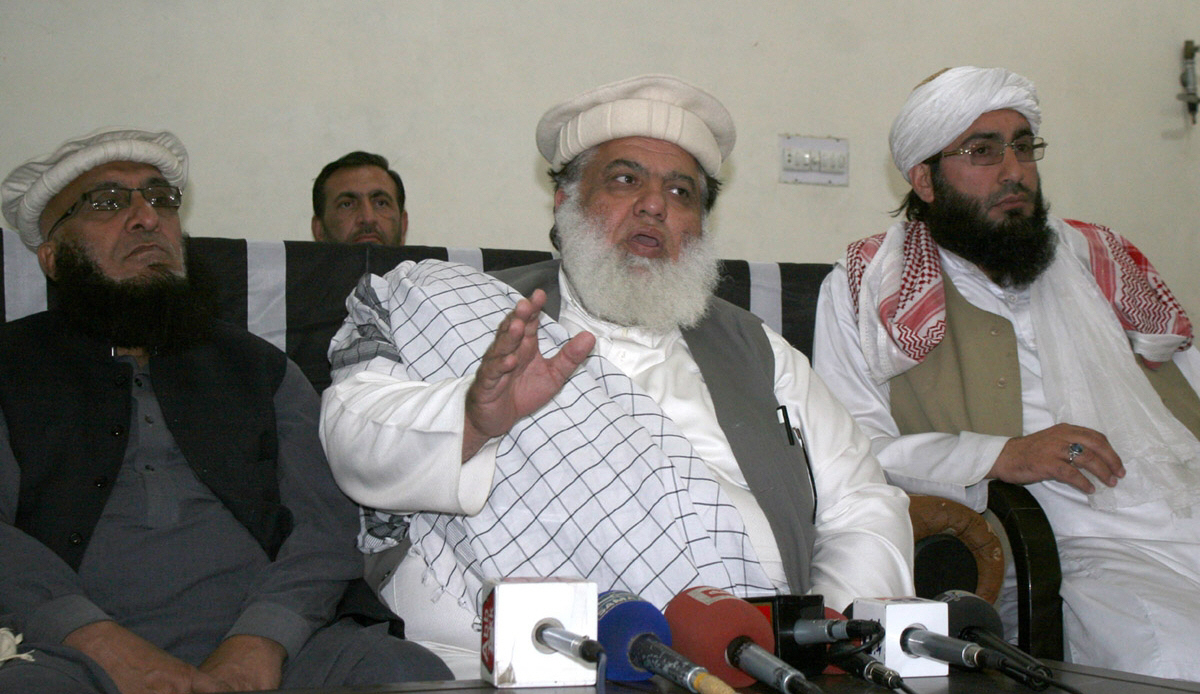 the government is merely passing time which suggests it is making preparations for a military operation says maulana attaur rehman provincial chief of jui f photo express