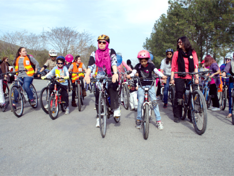 rally participants lining up at the start on margalla road islamabad photo express