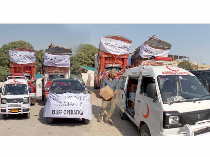 vehicles carrying relief supplies from bahria foundation for drought victims ready to leave for tharparkar photo pr