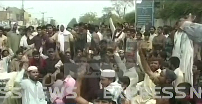 express news screengrab showing protestors on khanewal road in multan on march 10 2014