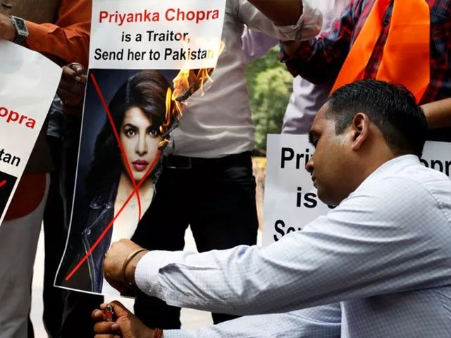 supporters of hindu sena a right wing hindu group shout slogans and burn posters of priyanka chopra photo reuters supporters of hindu sena a right wing hindu group shout slogans and burn posters of priyanka chopra photo reuters