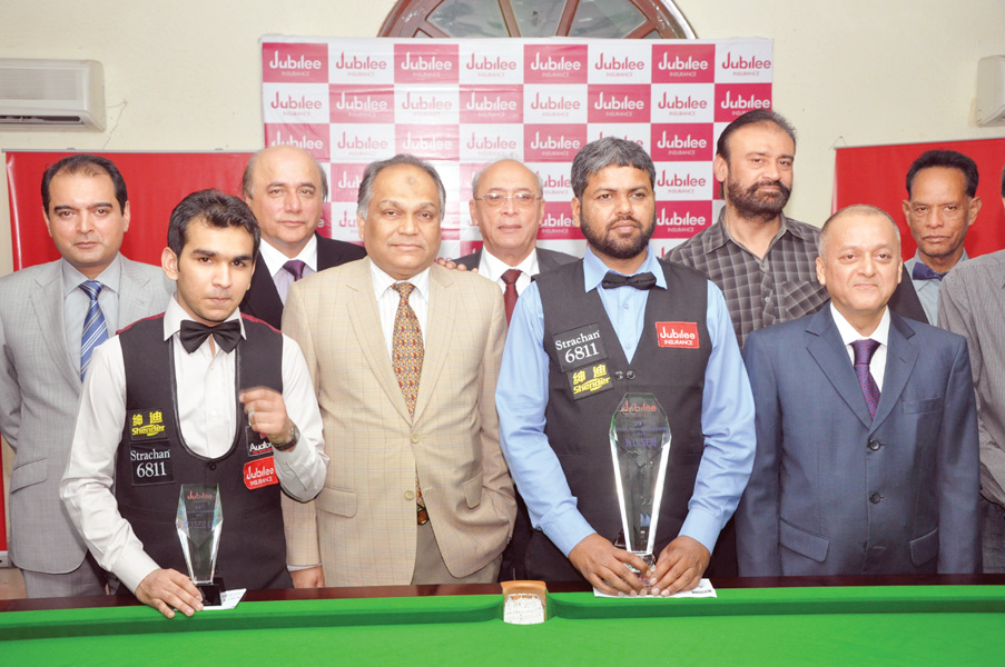 mohammad asif toba stands proud with the national snooker championship trophy after beating his opponent at karachi gymkhana photo pbsa