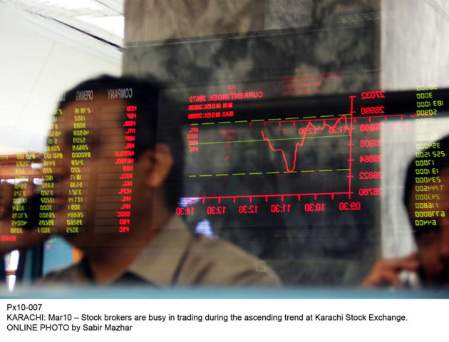 stock brokers busy in treading at karachi stock exchange photo online stock brokers busy in treading at karachi stock exchange photo online