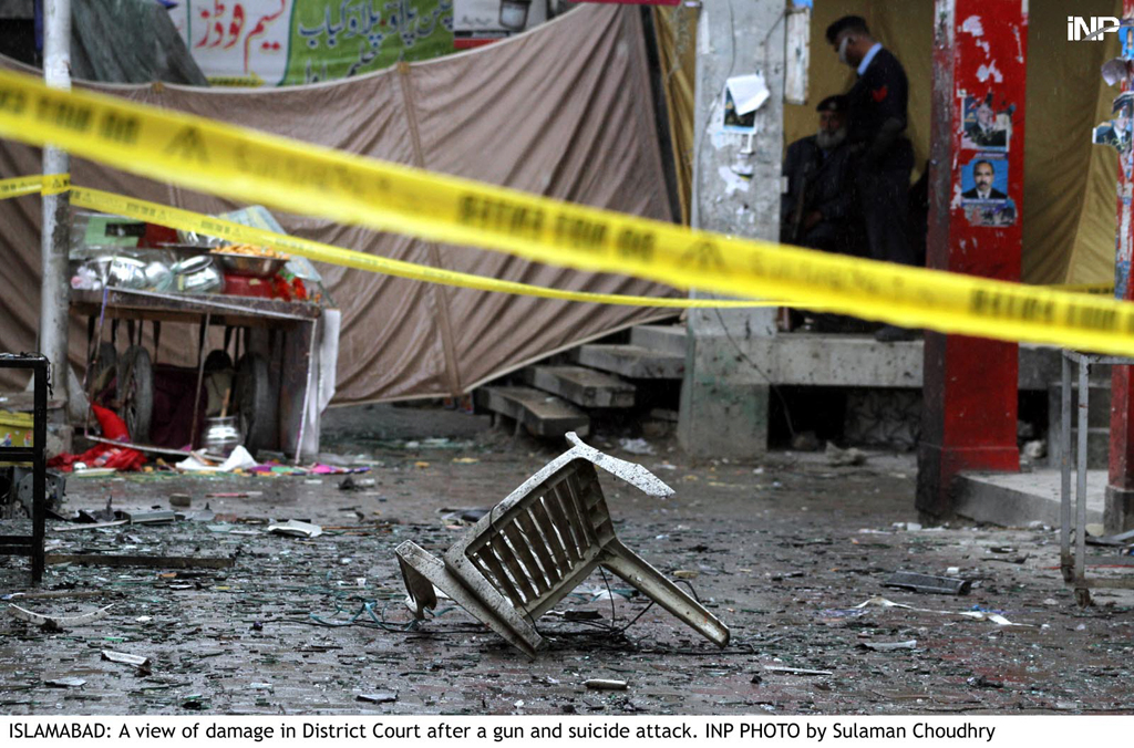 a view of damage in district court in islamabad after a gun and suicide attack on monday march 3 2014 photo inp